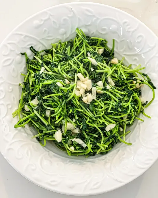 Snow Peas Chicken served at Hop Tung