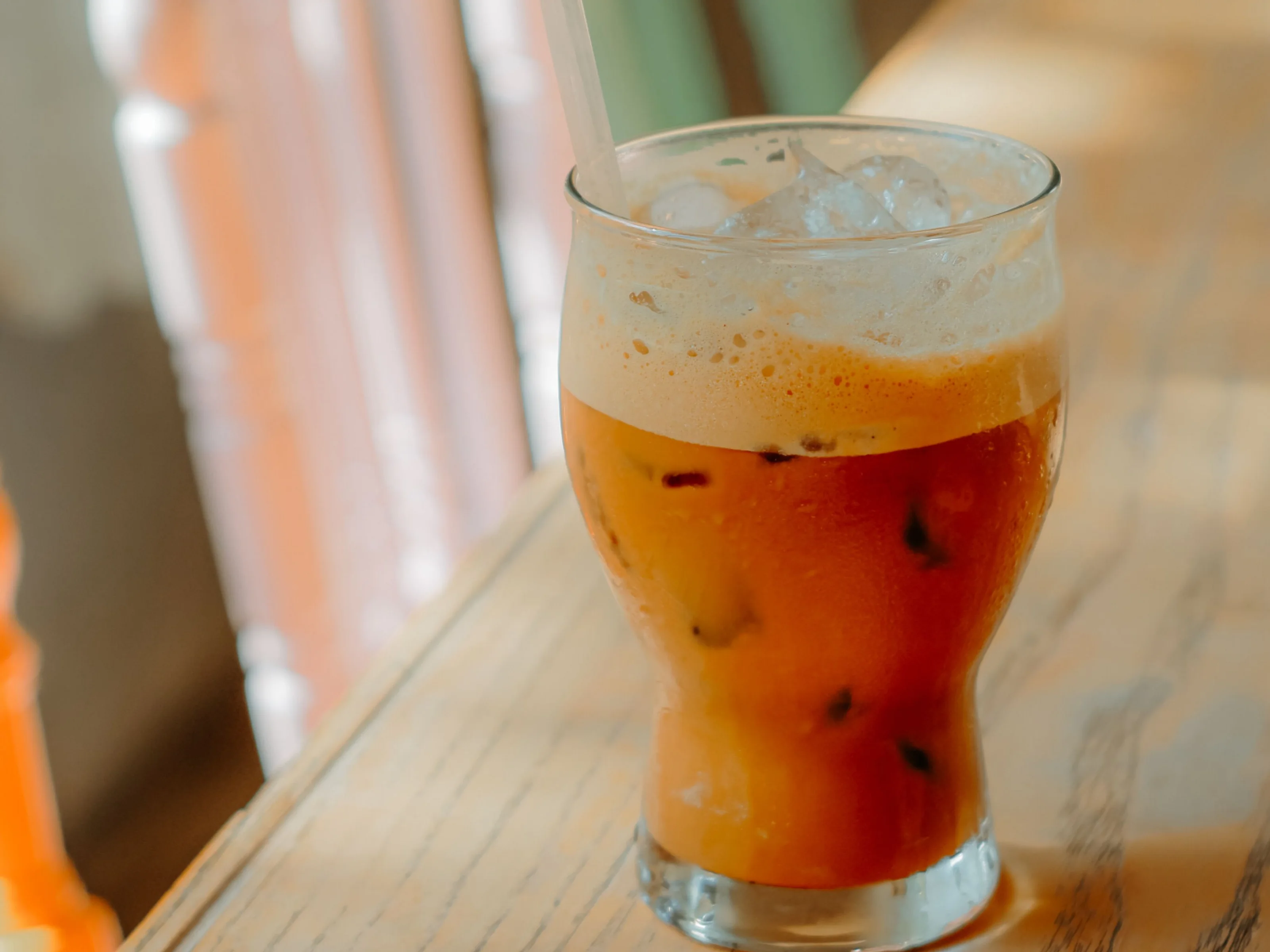 Thai iced tea in a tall glass, Hop Tung's Thai-style tea